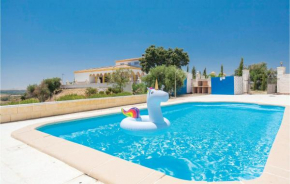 Amazing home in Lora del Rio with WiFi, Outdoor swimming pool and 5 Bedrooms